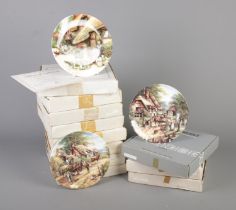 Eleven boxed cabinet plates. To include Royal Doulton and Wedgwood examples. All plates come with
