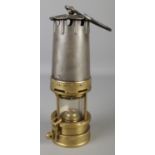 A vintage brass miners lamp. Marked 3S, Patent 23186.