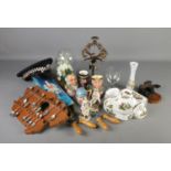 A box of mixed collectables including spoons on rack, glass dome, candlestick, Staffordshire