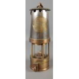 A Protector Lamp & Lighting Co Ltd Eccles Type J.C.M miners lamp.