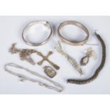 A quantity of silver and white metal jewellery. Includes two silver bangles, necklaces, etc. 74g.