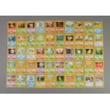 A quantity of Pokemon cards. Includes base set, base set 2, jungle, fossil, Team Rocket, base set
