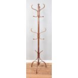 A bentwood coat/hat stand. 182cm tall. Split and repair to the top segment.