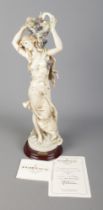 A Giuseppe Armani limited edition figure titled 'Lilacs and Roses' depicting maiden carrying