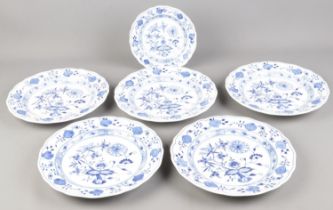 Six Meissen plates in the 'Onion' pattern, including five larger examples. Diameter of largest
