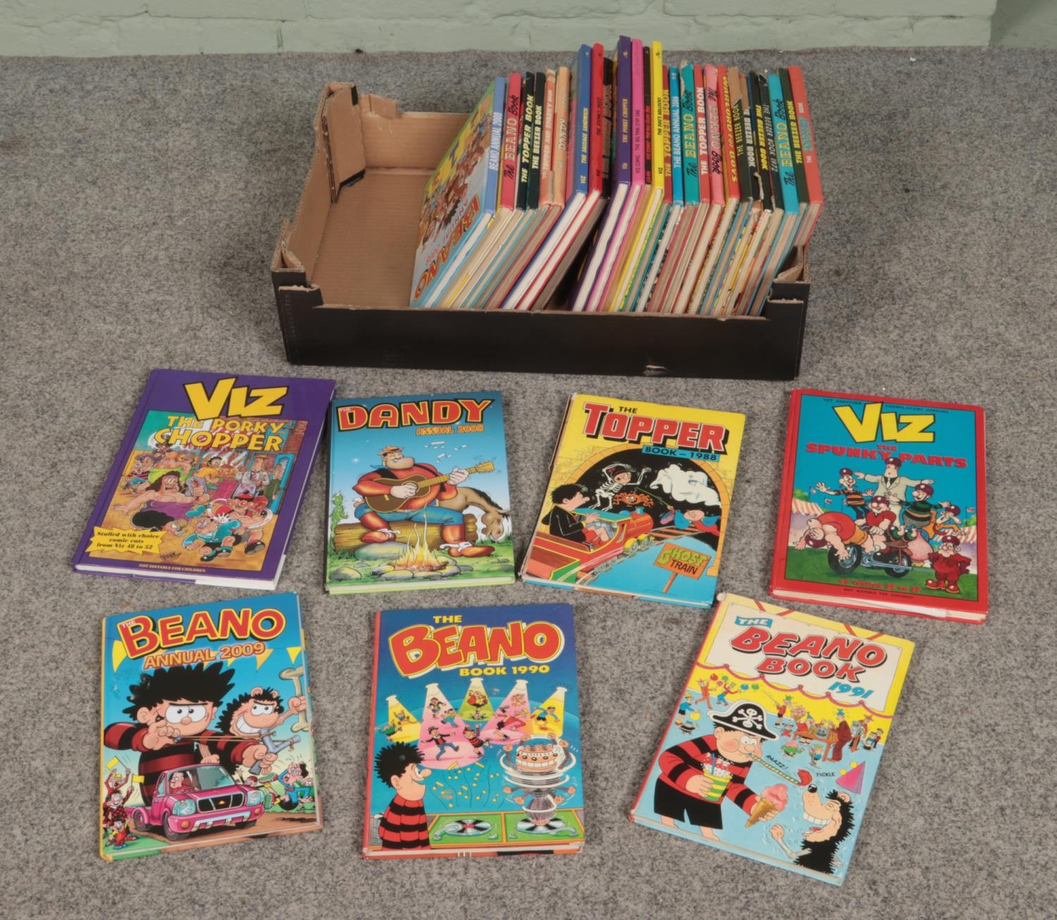 A box of mostly 1970's and 1980's comic annuals to include Beano, Dandy, Viz and Topper.