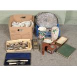 Two boxes of miscellaneous. Includes Kodak 8mm cine camera, silver plate serving tray, cutlery,