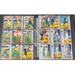 A album of Futera cricket collectors cards. Includes World Series, Sheffield Shield, Weapons, Test