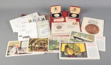 A quantity of collectables to include Pobjoy Mint commemorative crowns, Robert The Bruce Medallic