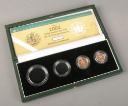 The 2002 United Kingdom Gold Proof Sovereign Collection with two gold coins, full sovereign and half