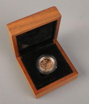 A cased Queen Elizabeth II gold full sovereign, dated 2015. 8g.