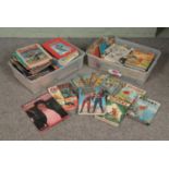 Two boxes of assorted vintage books, annuals and paper comics to include Ladybird, Rupert, The