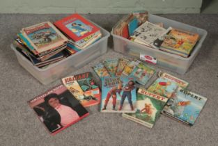 Two boxes of assorted vintage books, annuals and paper comics to include Ladybird, Rupert, The