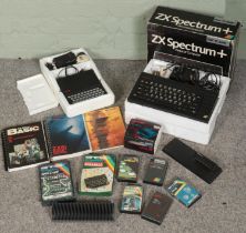 A boxed Sinclair ZX Spectrum Personal Computer and accessories. Includes ZX81, games, manuals, etc.