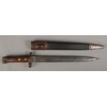 A British 1888 pattern Lee Metford bayonet by Mole, with scabbard. Blade length 30cm. CANNOT POST