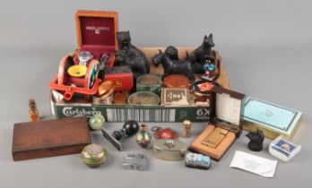 A tray of collectables. Includes tin plate, E & J Collectables Ltd coal figures, Swiss Active