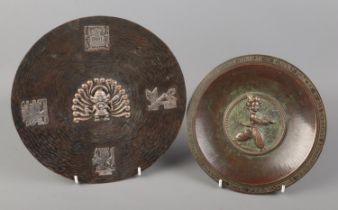 A German bronze presentation plate by Hermann Noack depicting Sarotti chocolate figure to centre