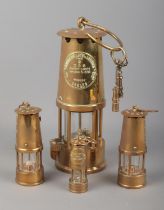 A Protector Lamp and Lighting miners safety lamp, type 6 along with selection of miniature lamps.