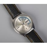 A men's Seiko 5 automatic wristwatch with day date display.