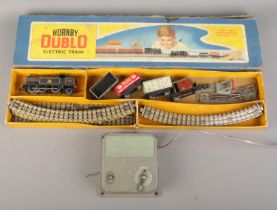 A boxed Meccano Hornby Dublo electric train set along with a Meccano power station.