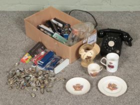 A mixed lot of a bakelite phone, commemorative cups, Brentleigh ware vase and a large quantity of