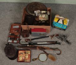 A quantity of mixed collectables including onyx rotary dial telephone, walking sticks & umbrellas,