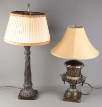 Two ornate table lamps. Includes composite example with mythical beast handles. Tallest example (