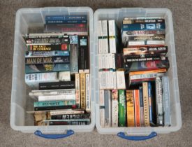 Two boxes of military themed books, containing fiction and non-fiction examples including 'The War