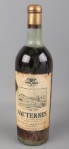 A sealed bottle of vintage 1955 Sauternes wine. Devienne , Lafont & Cie Bordeaux.