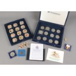 Two cases of commemorative coins. Includes Diamond Wedding Photographic Coin examples, etc.