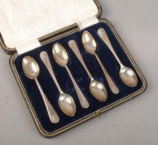A cased set of six silver demitasse spoons. Assayed Sheffield 1925 by John & William F Deakin. 54g.