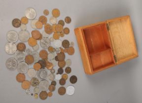 A quantity of coins. Includes commemorative crowns, Victorian Model 10th farthing is case, early