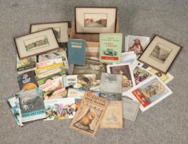 A box of ephemera. Includes albums of Brooke Bond, Wills and Players picture cards, framed prints,