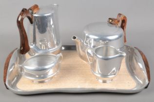 A five piece piquet ware set comprising of coffee pot, tea pot, milk jug, sugar bowl and tray.