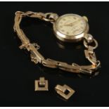A ladies 9ct gold Rotary manual wristwatch with expanding strap and two extra links. 18.6g gross