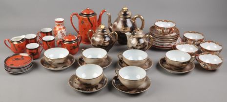 Three Oriental eggshell tea services, all with gilt decoration. To include teapots, cups and