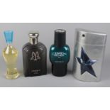 Four large cologne bottles to include Captain Molyneux, Maxim's, etc.