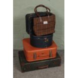 A selection of luggage and handbags including a hatbox, Harris Tweed handbag and Vanguard suitcase.