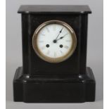 A black slate mantel clock featuring roman numeral face. With pendulum, no key. Not working.