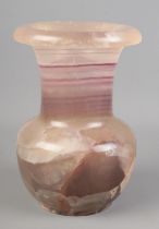 A purple fluorite vase of baluster form. Height 18cm.