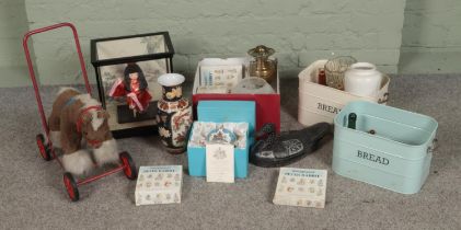 A collection of miscellaneous to include Wedgwood Peter Rabbit, brass oil lamp, child's toy horse,