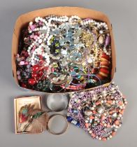 A box of assorted costume jewellery, to include boxed Scottish Plume brooch, necklaces, bracelets,