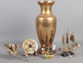 A collection of Orientalwares. Includes white metal junk, large brass vase, brass bi disc, etc.