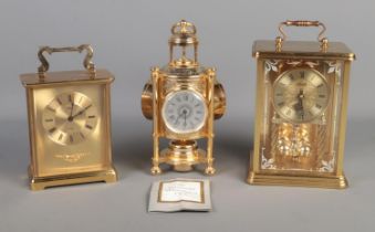 Three gilt quartz mantle clocks, to include Hermle torsion and Franklin Mint 'The International
