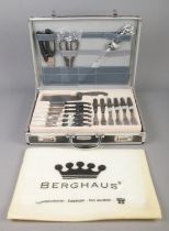 A cased Berghaus cutlery set. Some pieces missing.