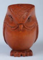A Japanese carved Netsuke in the form of an owl