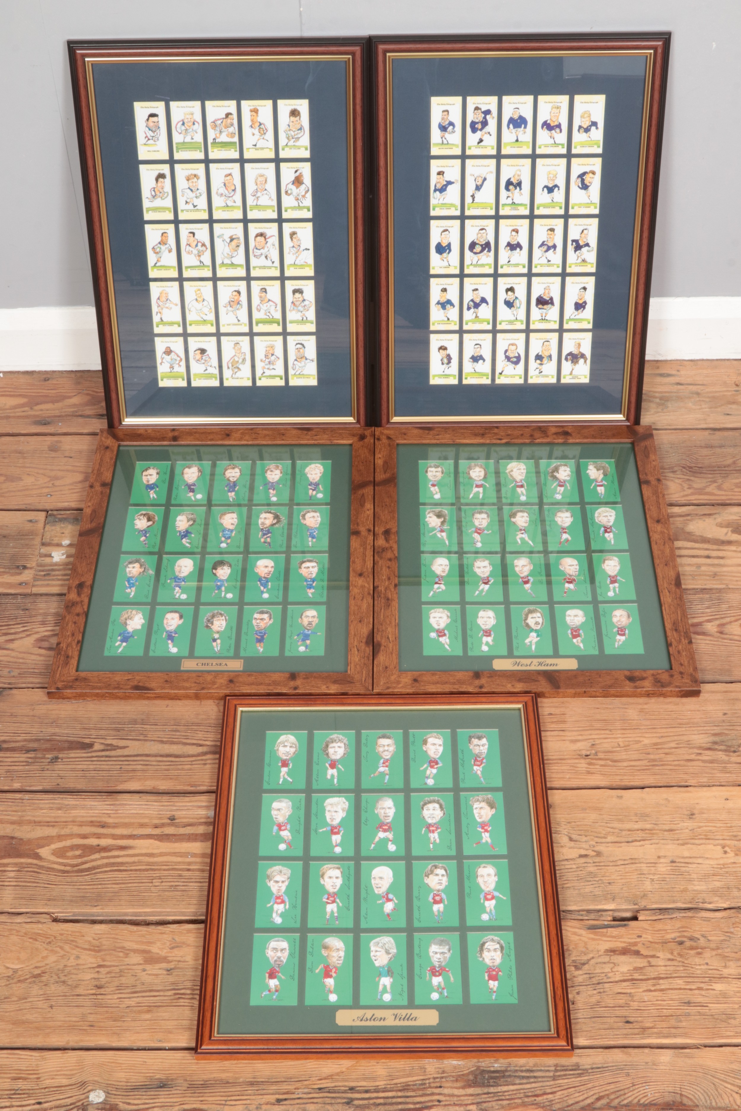 A quantity of framed collectable trading cards including Daily Telegraph rugby world cup 1995