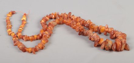 A string of graduated shard amber beads. 54g.