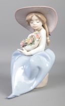 A Lladro figure, titled: 'Fragrant Bouquet Girl', No. 5862. Good condition.