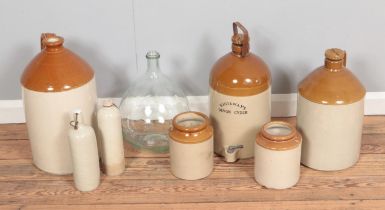 A collection of stoneware to include Whiteways Devon Cyder flagon and Moira pottery examples along